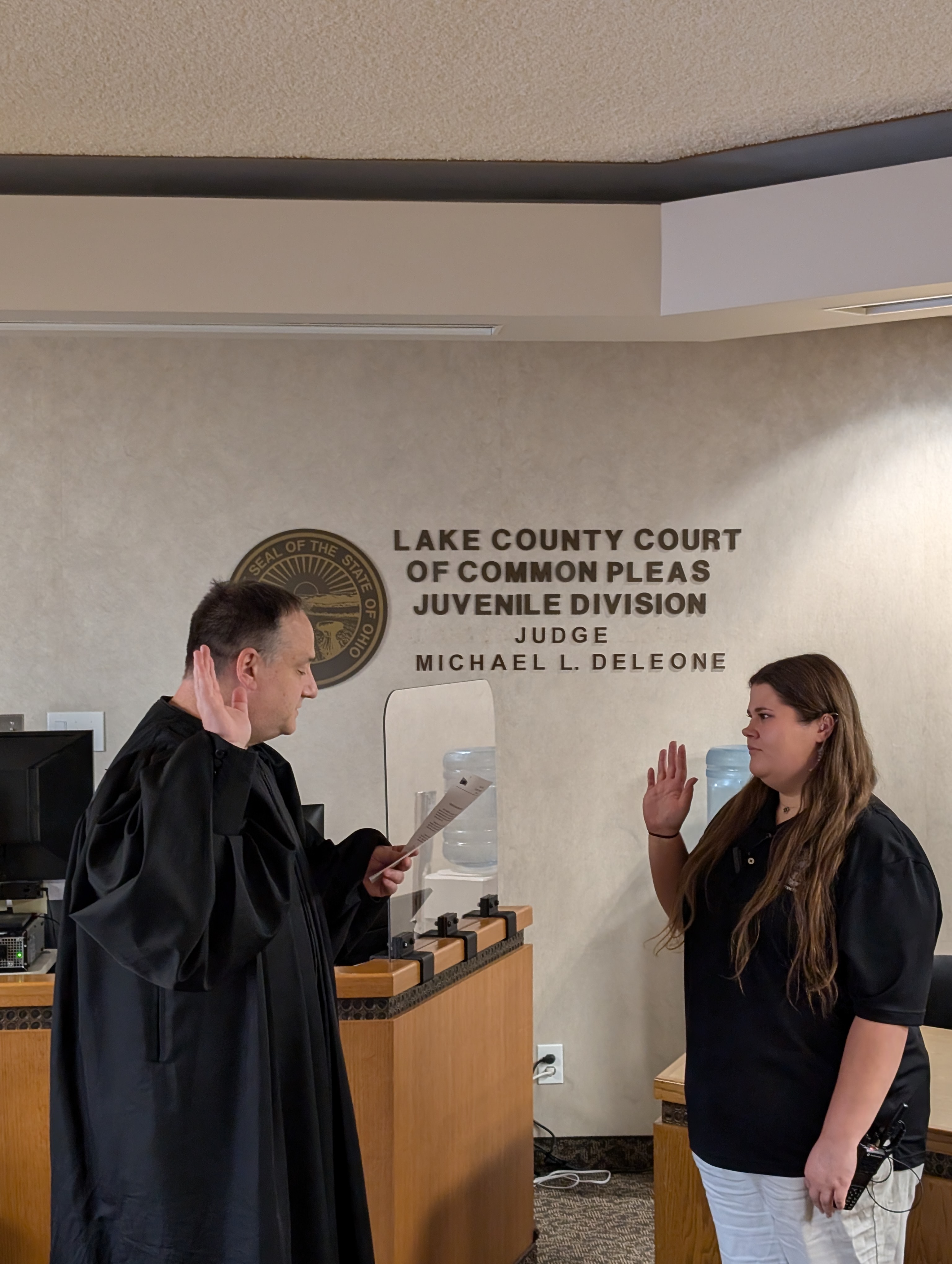 Judge DeLeone swearing in Kayle Chandler as a Juvenile Corrections Officer.