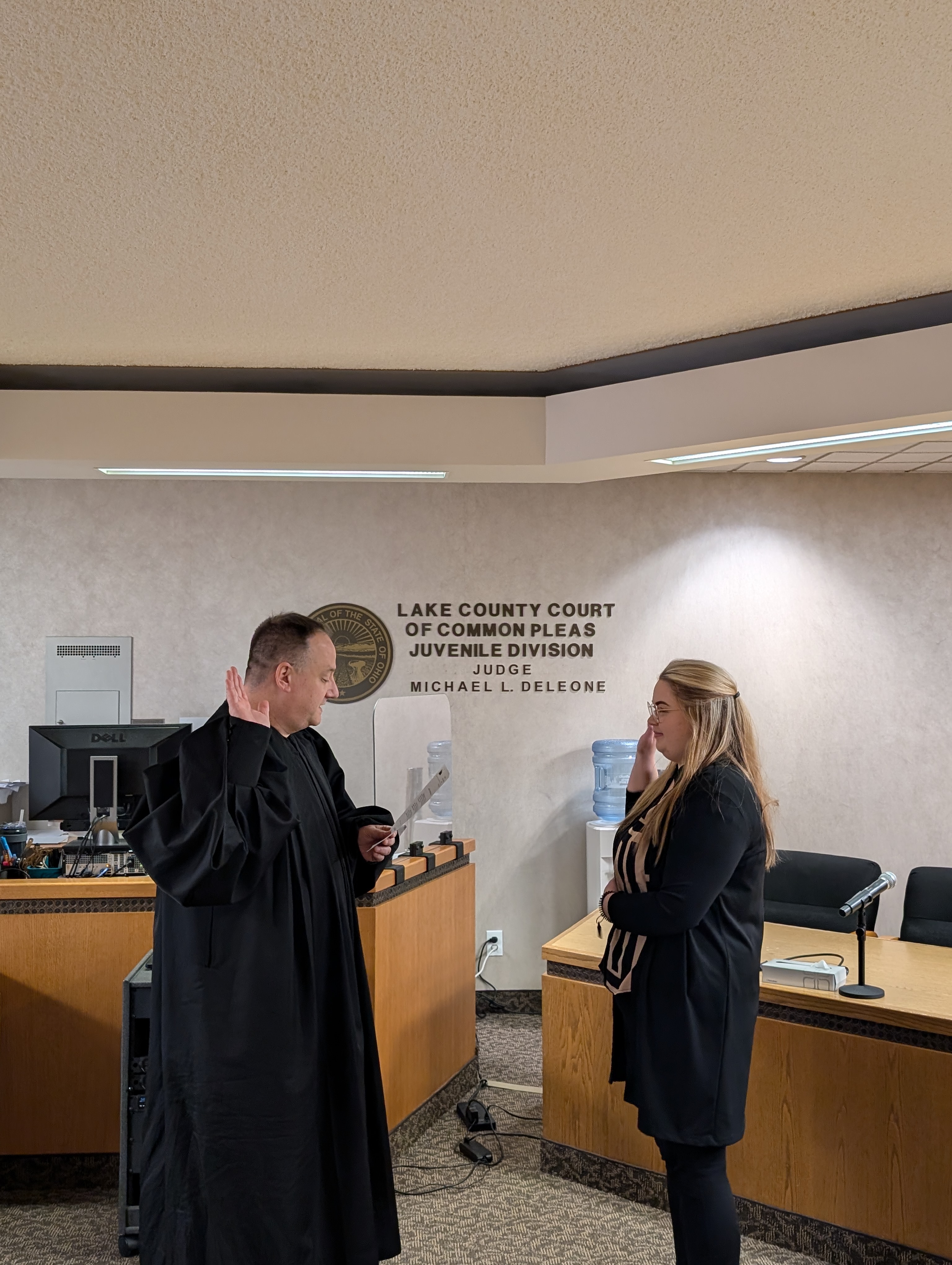 Judge DeLeone swearing in Hayley Tycast as a Juvenile Court Deputy Clerk.