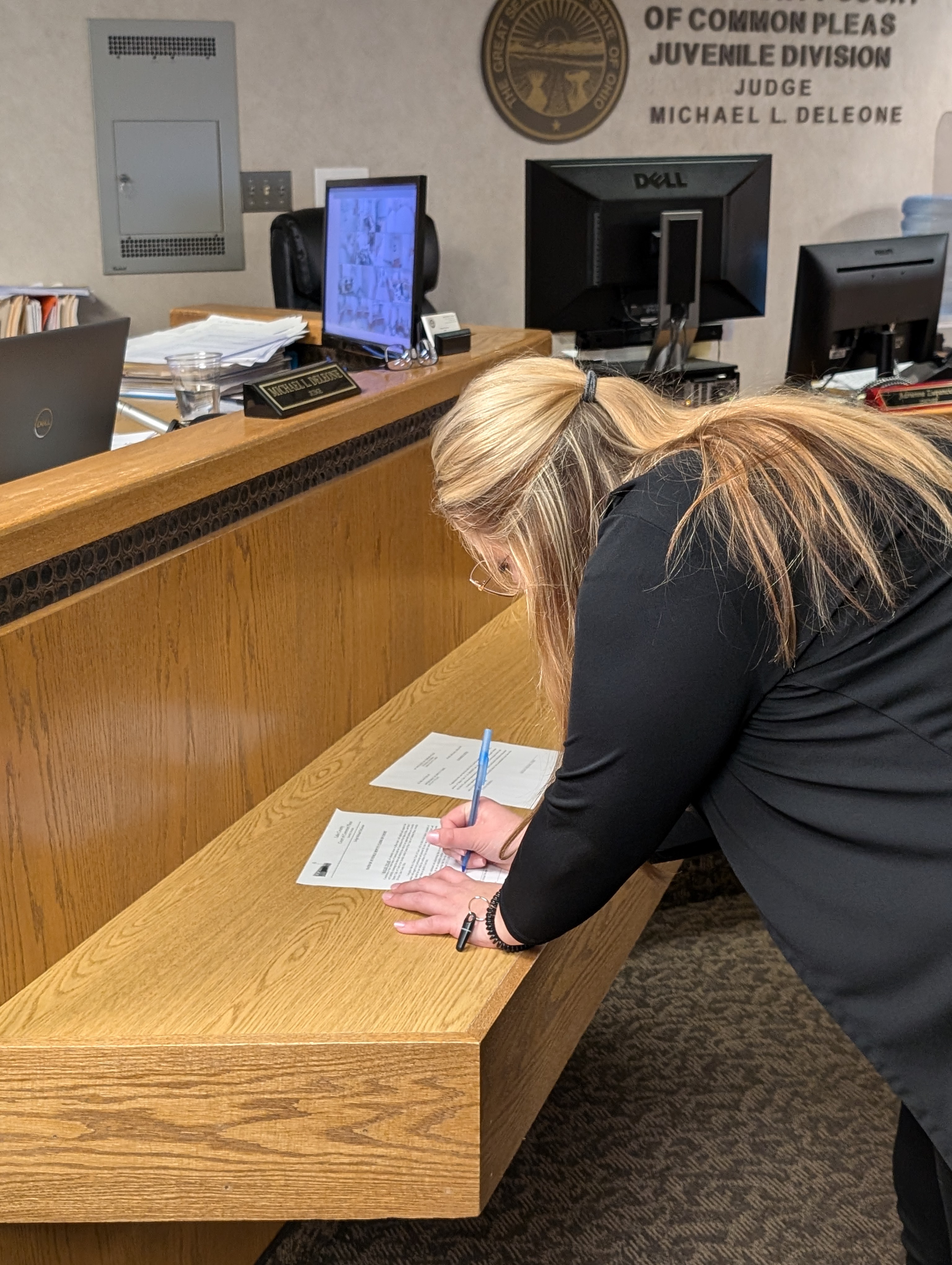 Judge DeLeone swearing in Hayley Tycast as a Juvenile Court Deputy Clerk.