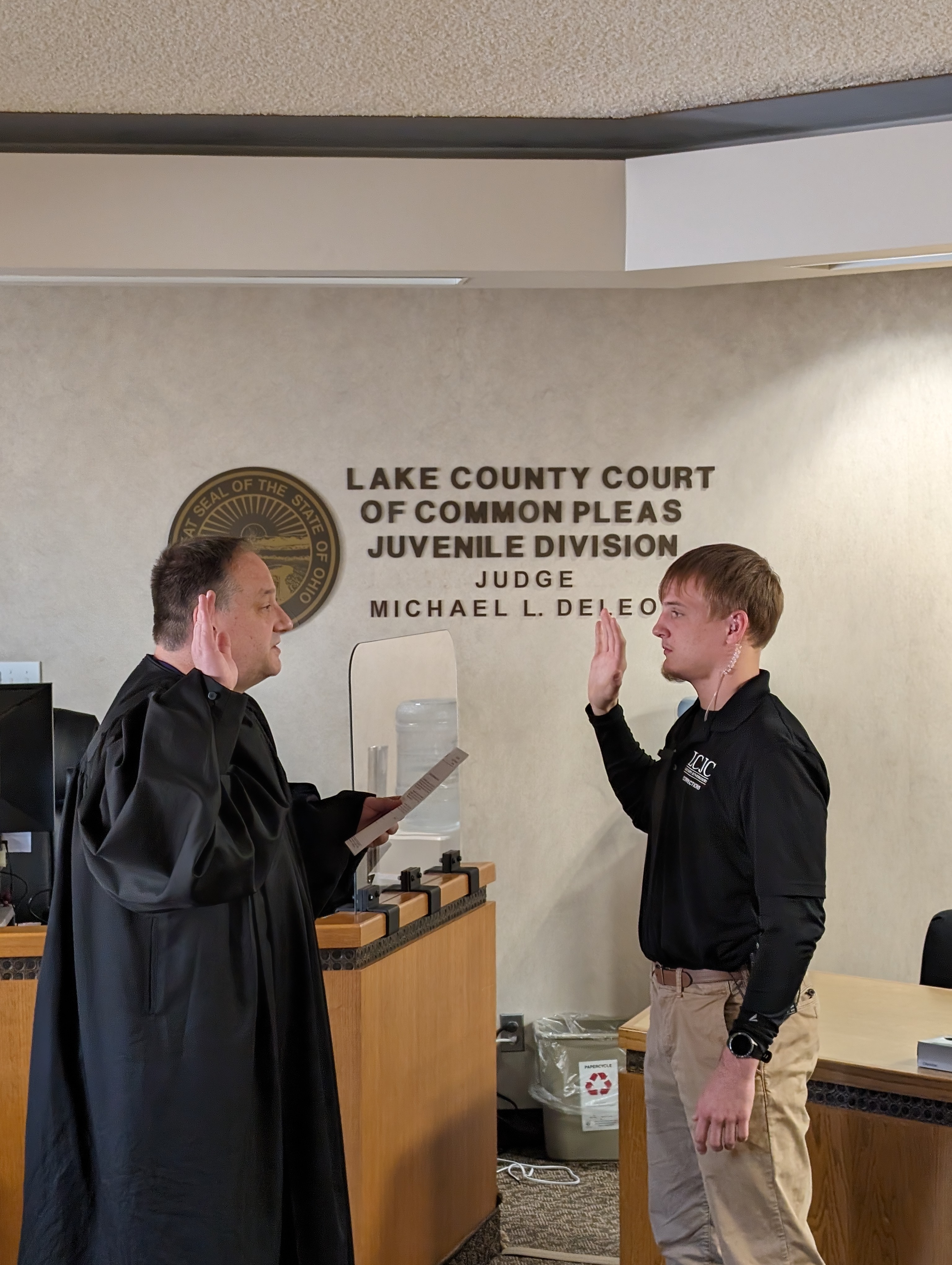 Judge DeLeone swearing in Jack Haskin as a Juvenile Corrections Officer