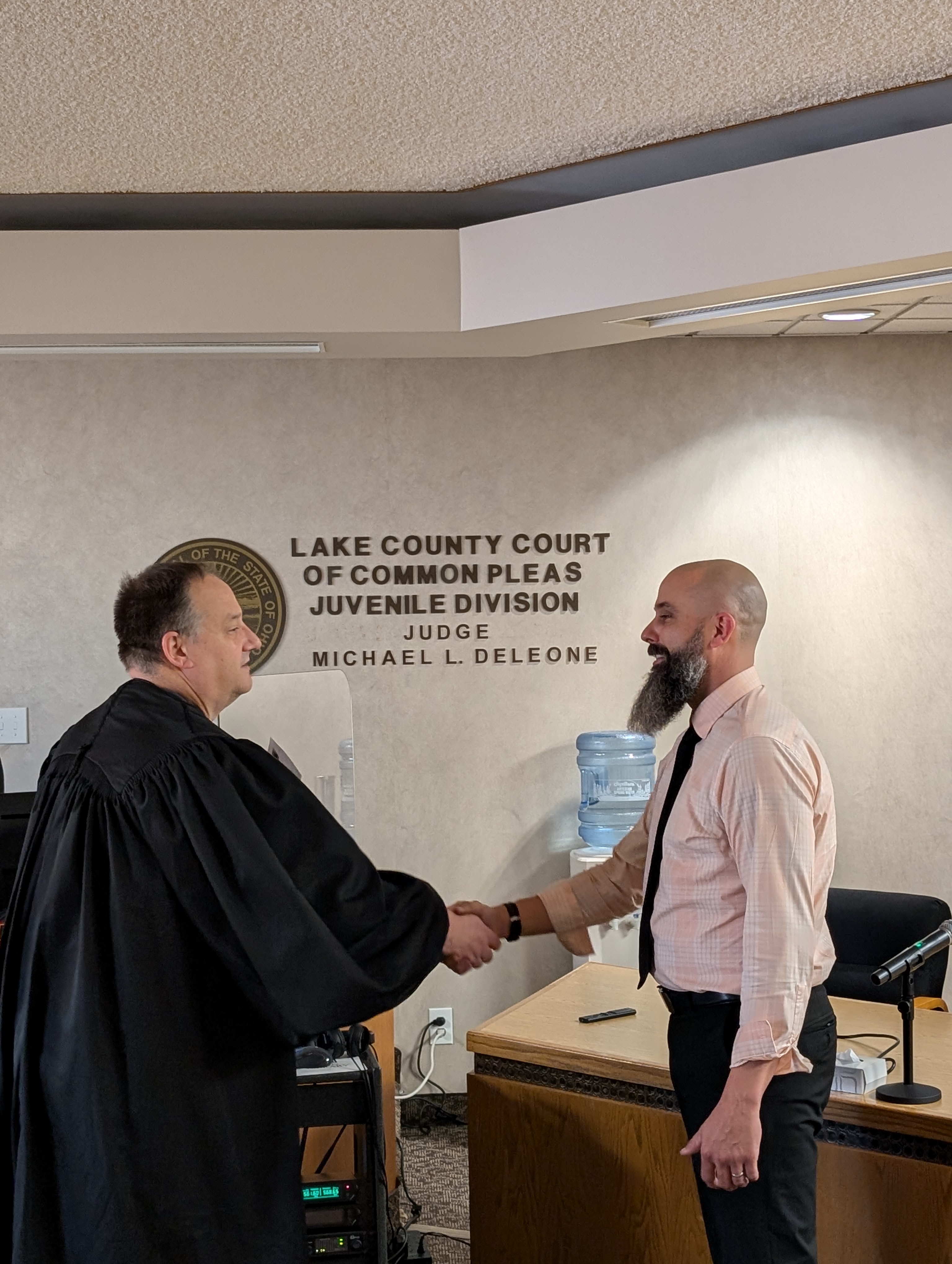 Judge DeLeone swearing in John Zinnicker as Chief Deputy Clerk.