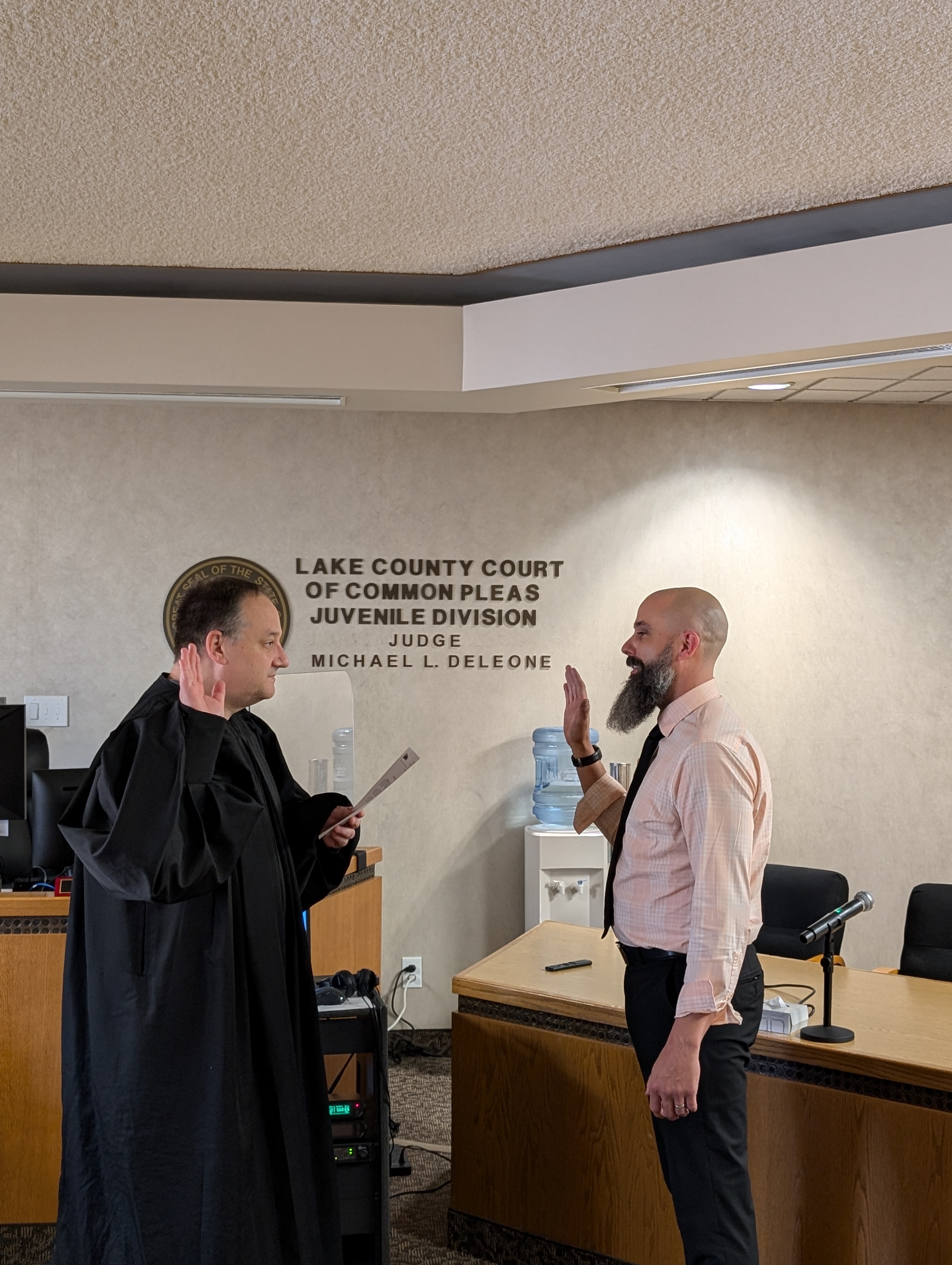 Judge DeLeone swearing in John Zinnicker as Chief Deputy Clerk.