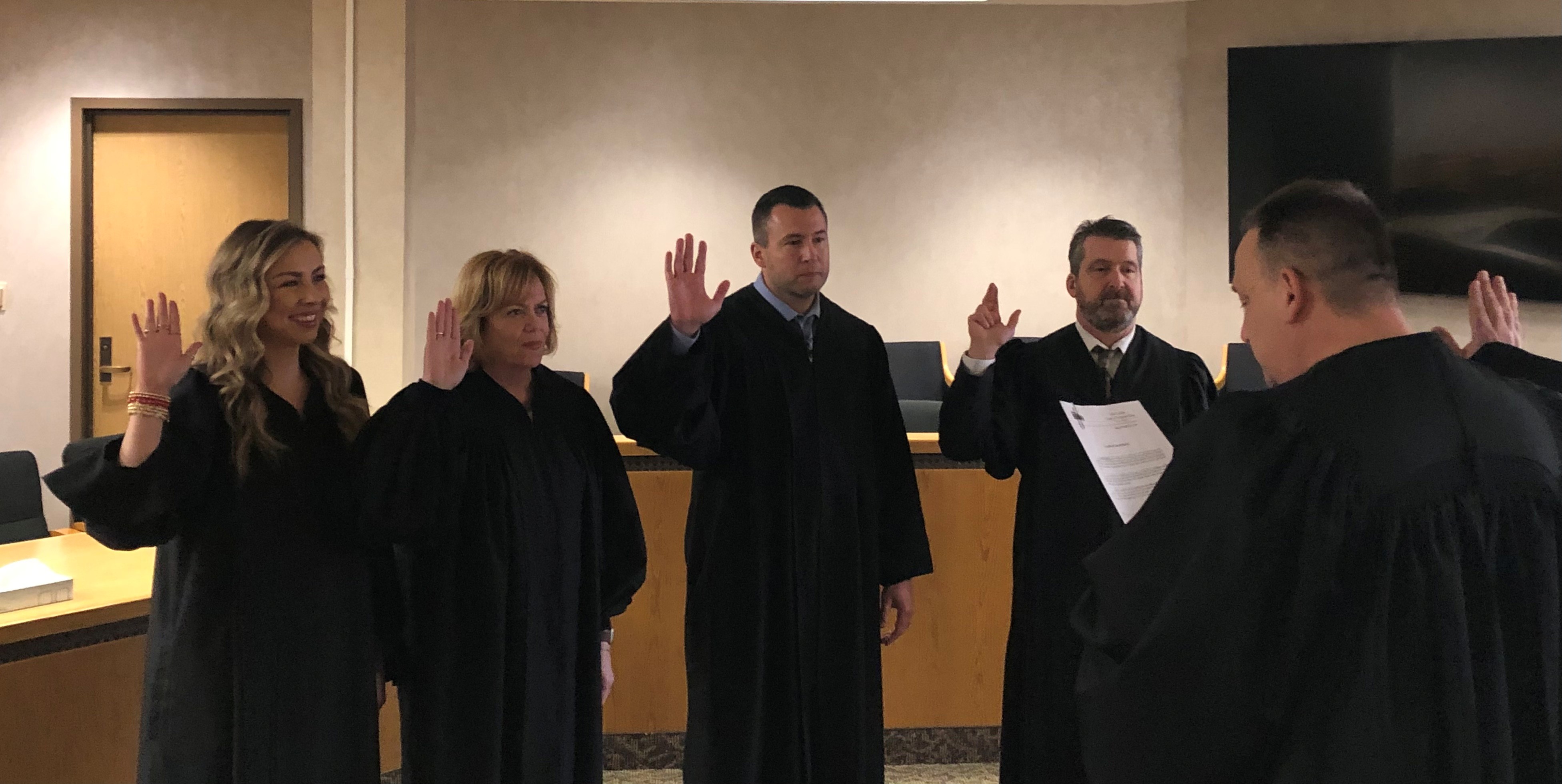 Lake County Juvenile Court Magistrates (Jessica Wright, Janette Bell, Christopher Tucci, and Ben Neylon) renewing their Oaths of Office under Judge Michael L. DeLeone