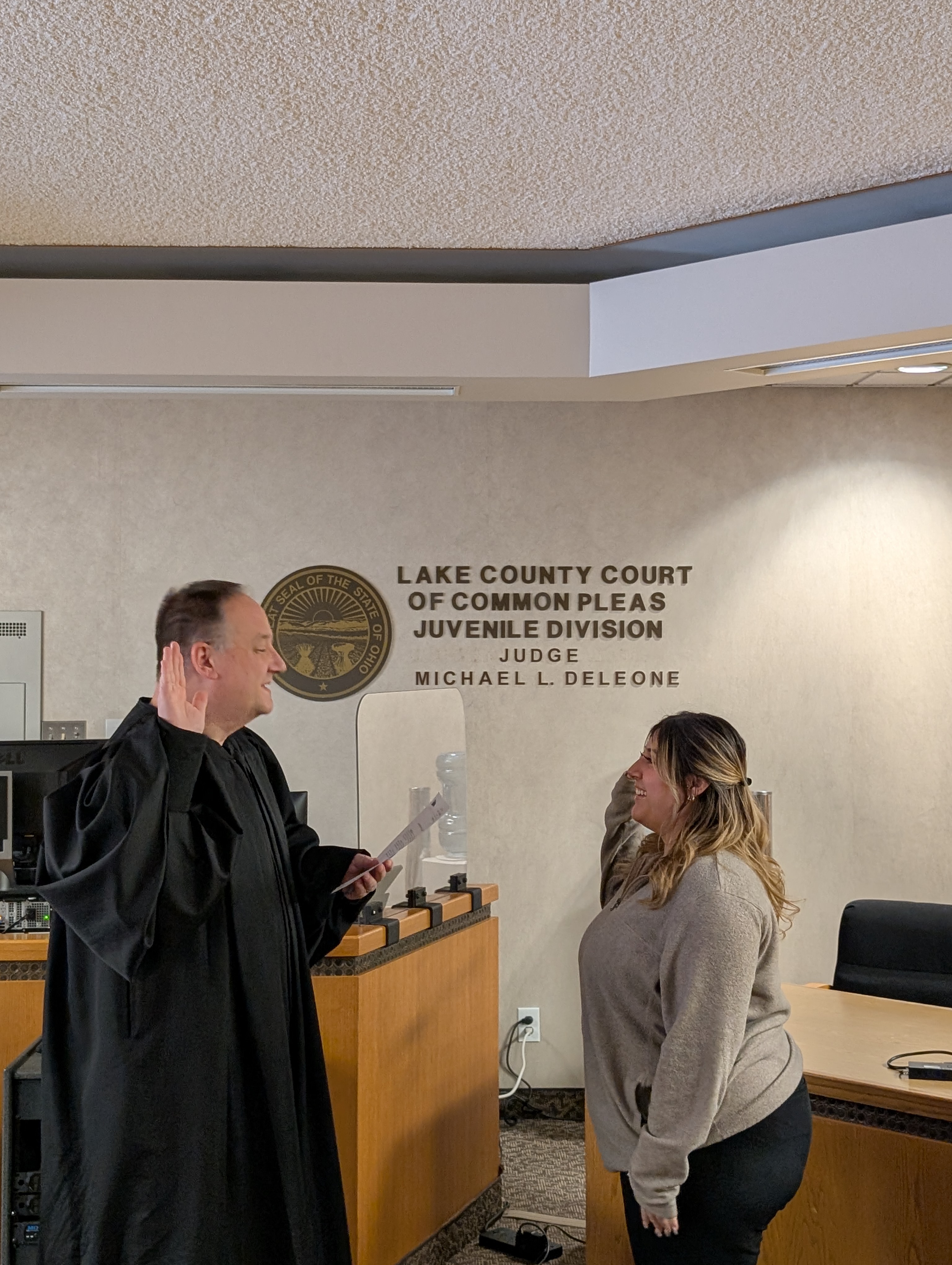 Judge Deleone swearing in Jarissa Razo as a Deputy Clerk