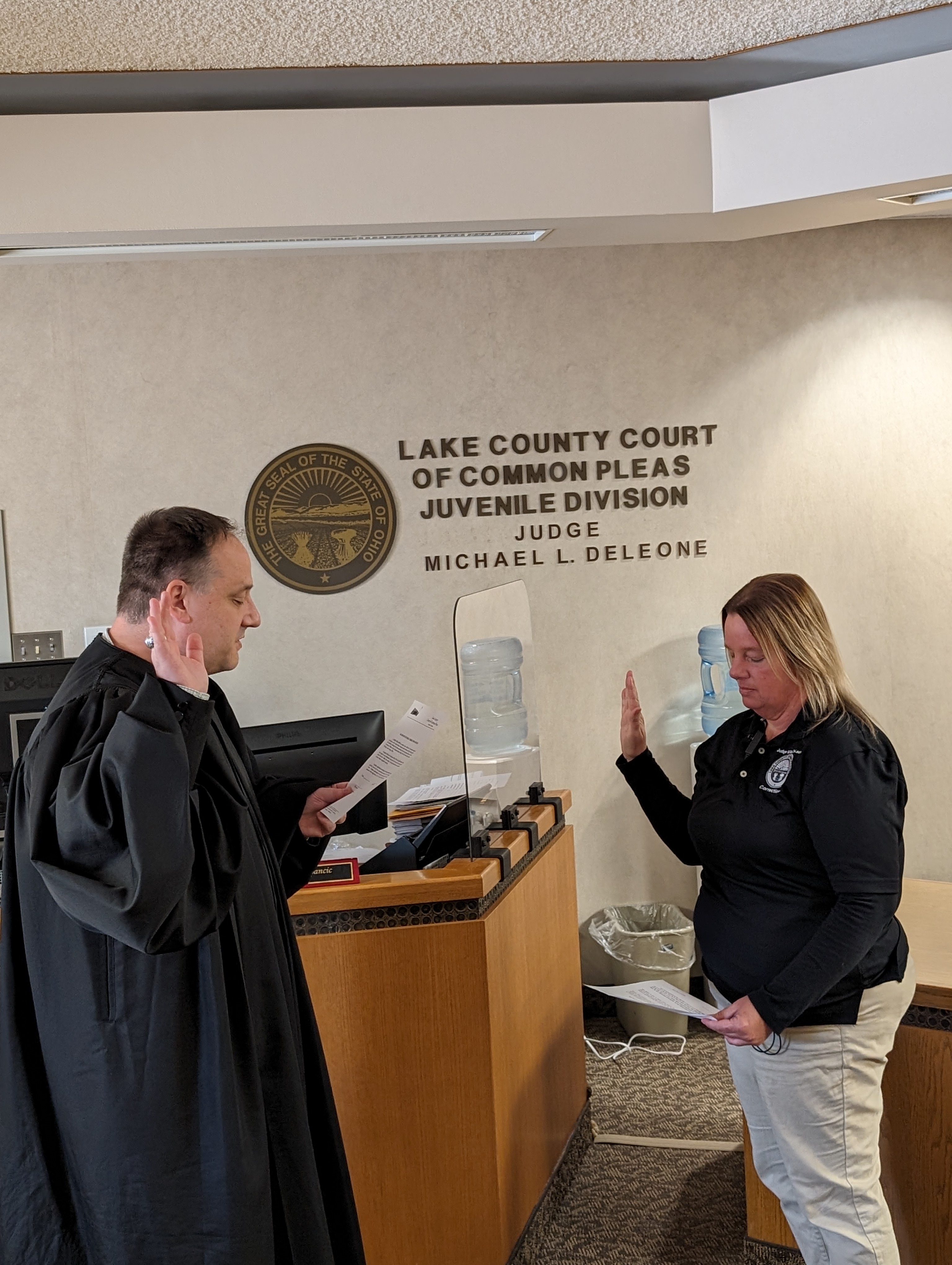 Judge DeLeone swearing in Sadie Mollard as a Juvenile Corrections Officer