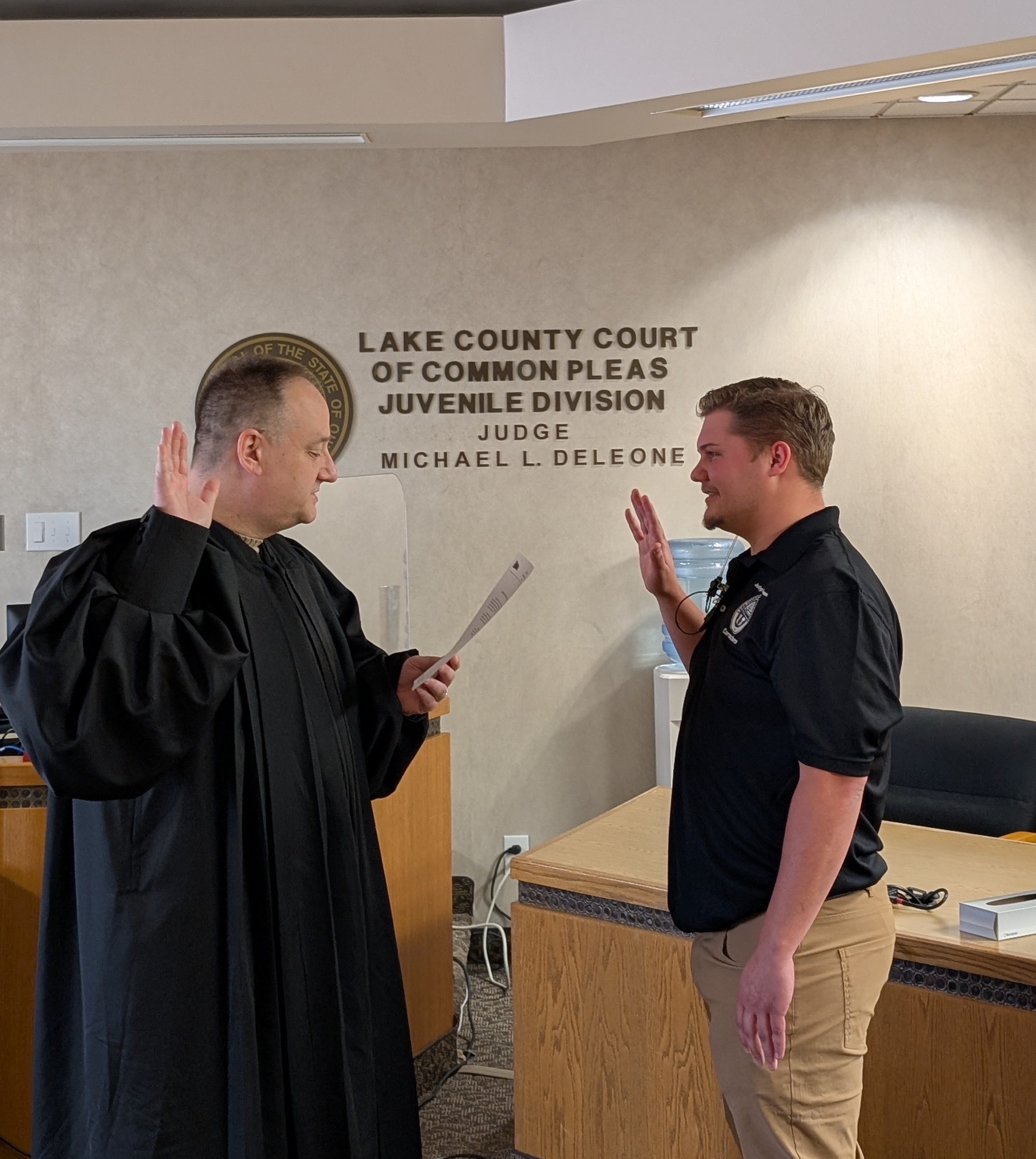 Judge DeLeone swearing in John Jusko as a Juvenile Corrections Officer